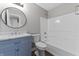 Bathroom features a vanity with marble countertop, modern sink, and shower-tub combo at 8158 S Firefly Dr, Pendleton, IN 46064