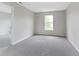 Bedroom featuring neutral carpet and window view at 8158 S Firefly Dr, Pendleton, IN 46064