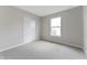 Bedroom with neutral carpet, closet, and natural light from the window at 8158 S Firefly Dr, Pendleton, IN 46064