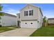 Picture of a two-story house featuring a two-car garage and well-maintained lawn at 8158 S Firefly Dr, Pendleton, IN 46064
