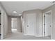 Hallway featuring neutral carpet, recessed lighting, and multiple doorways at 8158 S Firefly Dr, Pendleton, IN 46064