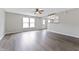 Spacious living room featuring wood-look floors and great natural light at 8158 S Firefly Dr, Pendleton, IN 46064