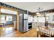 Inviting kitchen with stainless steel appliances, and an eat-in dining area at 8230 Linda Leigh Ln, Indianapolis, IN 46217