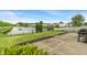 Spacious backyard with well-manicured lawn, fence, and patio, perfect for outdoor entertaining at 8238 Crackling Ln, Indianapolis, IN 46259