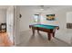 Spacious game room with pool table and carpet at 8238 Crackling Ln, Indianapolis, IN 46259