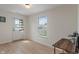 Bright room with a door to the outside and a work desk at 8238 Crackling Ln, Indianapolis, IN 46259