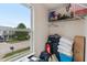 Window view with storage of luggage, containers, boxes and shelves at 8238 Crackling Ln, Indianapolis, IN 46259