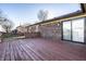 Spacious wooden deck offering ample room for outdoor seating and entertaining with fenced backyard at 8510 E Mcgregor Rd, Indianapolis, IN 46259