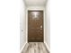 Interior view of the front door with hard surface floors and neutral wall color at 8510 E Mcgregor Rd, Indianapolis, IN 46259
