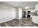 Well-lit kitchen area with stainless steel appliances and white cabinets at 8510 E Mcgregor Rd, Indianapolis, IN 46259