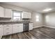 Modern kitchen features updated stainless steel appliances and gray countertops at 8510 E Mcgregor Rd, Indianapolis, IN 46259