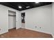 Finished basement area with a closet for storage and view into another room at 8513 S 575 W, Morgantown, IN 46160