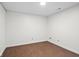 Finished basement space with vinyl flooring and white painted walls, ready to be customized at 8513 S 575 W, Morgantown, IN 46160