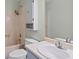 Bright bathroom featuring a shower over tub combination, large vanity, and built-in storage at 8513 S 575 W, Morgantown, IN 46160