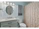 Stylish bathroom with modern fixtures, decorative lighting, and a combination shower and tub at 8513 S 575 W, Morgantown, IN 46160