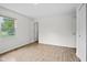 Bright, spacious bedroom with wood-look flooring, natural light, and closet space at 8513 S 575 W, Morgantown, IN 46160