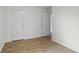 Neutral room featuring painted walls and laminate floors at 8513 S 575 W, Morgantown, IN 46160