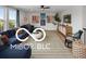 Cozy bonus room with comfortable seating, modern decor, and lots of natural light at 9602 Fall Creek Rd, Indianapolis, IN 46256