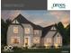 Stunning two-story brick home with stone accents, gabled roof, and manicured landscaping at 9602 Fall Creek Rd, Indianapolis, IN 46256