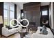 Modern living room with a sleek fireplace, large windows, and elegant decor at 9602 Fall Creek Rd, Indianapolis, IN 46256