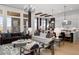 Spacious and bright living room with high ceilings, large windows, and an open concept design at 9602 Fall Creek Rd, Indianapolis, IN 46256