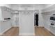 Spacious walk-in closet with custom shelving and racks, perfect for organizing wardrobes and accessories at 9602 Fall Creek Rd, Indianapolis, IN 46256