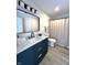 This bathroom includes modern vanity, sleek fixtures, and a clean aesthetic with a shower and toilet at 9655 Cedar Cove Ln, Indianapolis, IN 46250