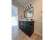 Updated bathroom features a modern vanity with matte black hardware and ample counter space at 9655 Cedar Cove Ln, Indianapolis, IN 46250