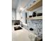 Close-up of a modern kitchen featuring open shelving and a stylish backsplash at 9655 Cedar Cove Ln, Indianapolis, IN 46250