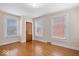 Bedroom with hardwood floors, three large windows for ample natural light at 989 Woodruff Pl E Dr, Indianapolis, IN 46201