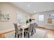 Elegant dining room with a modern table setting and bright natural light at 989 Woodruff Pl E Dr, Indianapolis, IN 46201