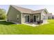 Spacious backyard with sliding glass doors and patio for outdoor entertaining at 1021 Boots Trl, Greenfield, IN 46140