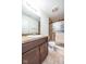Bathroom features a vanity with granite countertop and a sliding glass door shower at 1021 Boots Trl, Greenfield, IN 46140