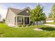Single-story home with siding, a well-kept lawn, and attractive landscaping at 1021 Boots Trl, Greenfield, IN 46140
