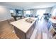 A large kitchen island with seating and stainless steel sink is the focal point of this modern home at 1021 Boots Trl, Greenfield, IN 46140