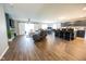 Open living area showcasing modern furnishings and kitchen with a breakfast bar at 1021 Boots Trl, Greenfield, IN 46140