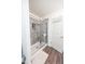 Modern bathroom with glass enclosed shower and stylish tiled walls at 1021 Boots Trl, Greenfield, IN 46140