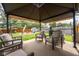 Backyard patio featuring comfortable seating under a gazebo with a spacious grassy yard at 1084 Lake W Dr, Brownsburg, IN 46112