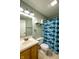 Bathroom with a blue shower curtain at 1084 Lake W Dr, Brownsburg, IN 46112