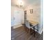 Welcoming entryway with stylish wood-look accent wall and modern desk space at 1084 Lake W Dr, Brownsburg, IN 46112