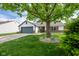 Charming single-story home featuring a lush front yard and attached garage at 1084 Lake W Dr, Brownsburg, IN 46112