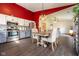 Well-lit kitchen featuring stainless steel appliances and dining table for Gathering meals at 1084 Lake W Dr, Brownsburg, IN 46112