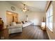 Bright living room with hardwood floors and large windows, perfect for Gathering time at 1084 Lake W Dr, Brownsburg, IN 46112