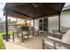 Covered patio with outdoor seating, perfect for relaxation and entertaining guests at 1084 Lake W Dr, Brownsburg, IN 46112