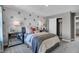 Stylish bedroom featuring star decor, comfortable bedding, and contemporary mirrored nightstands at 1136 Tansley Ln, Avon, IN 46123