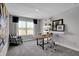 Bright office space with a large window, modern furnishings, and stylish decor accents at 1136 Tansley Ln, Avon, IN 46123
