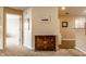 Hallway with warm neutral tones, decorative chest, and a view into other rooms at 11646 Winding Wood Dr, Indianapolis, IN 46235