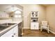 Well-designed kitchen with stainless steel appliances and abundant counter space, perfect for culinary enthusiasts at 11646 Winding Wood Dr, Indianapolis, IN 46235