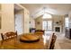 Inviting living room features a fireplace and ample natural light, creating a cozy and welcoming atmosphere at 11646 Winding Wood Dr, Indianapolis, IN 46235