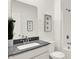 Bright bathroom with a white subway tiled wall and a shower and tub combo at 11904 Vale St, Indianapolis, IN 46235